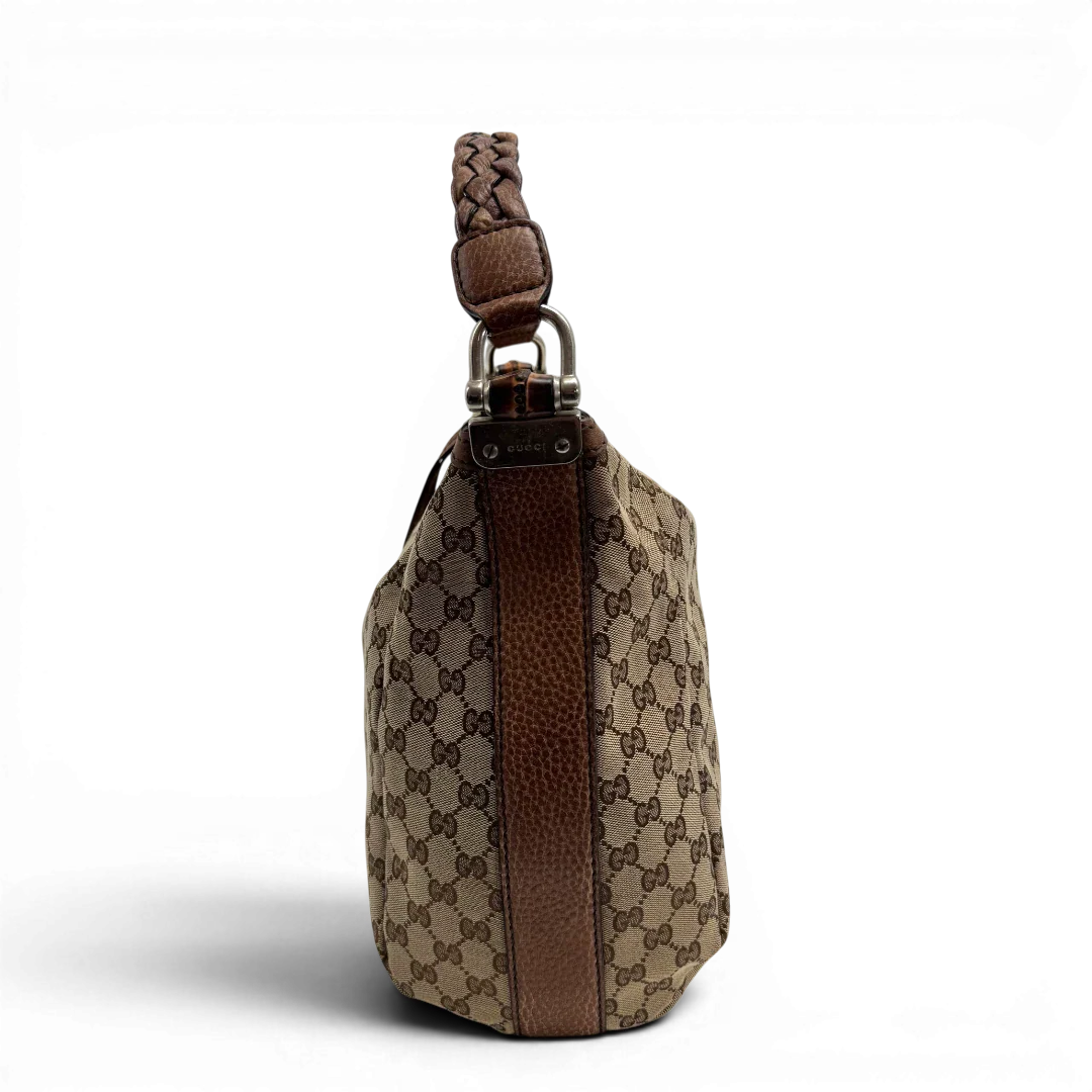 https://cdn.shopify.com/s/files/1/0564/9376/8855/files/Gucci_Schultertasche_Hobo_Bamboo_monogram_beige_vintage_GG2286.webp?v=1779968857
