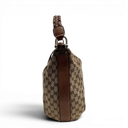 https://cdn.shopify.com/s/files/1/0564/9376/8855/files/Gucci_Schultertasche_Hobo_Bamboo_monogram_beige_vintage_GG2286.webp?v=1779968857