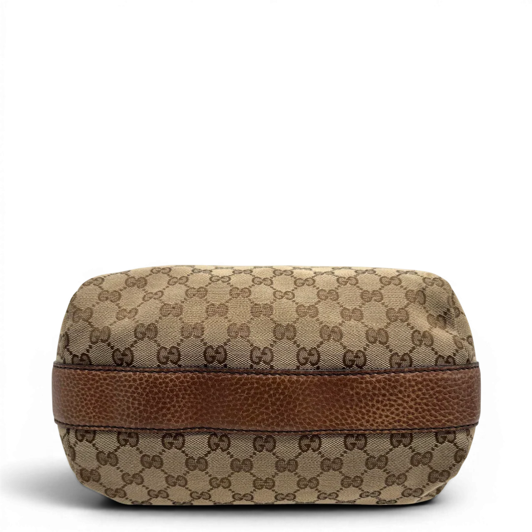 https://cdn.shopify.com/s/files/1/0564/9376/8855/files/Gucci_Schultertasche_Hobo_Bamboo_monogram_beige_vintage_GG2288.webp?v=1779968857