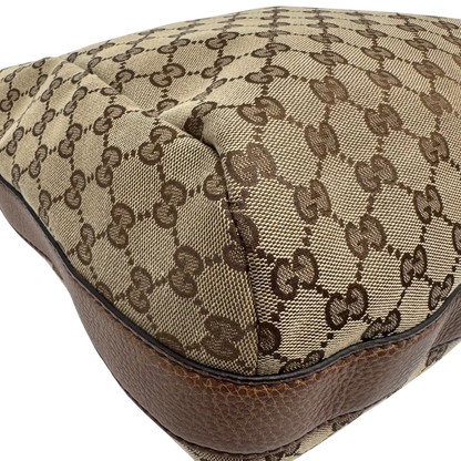 https://cdn.shopify.com/s/files/1/0564/9376/8855/files/Gucci_Schultertasche_Hobo_Bamboo_monogram_beige_vintage_GG2289.webp?v=1779968857