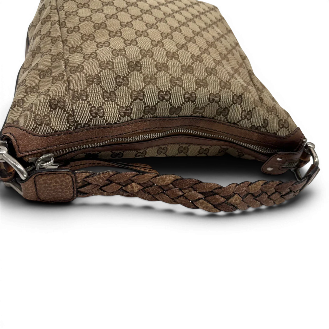https://cdn.shopify.com/s/files/1/0564/9376/8855/files/Gucci_Schultertasche_Hobo_Bamboo_monogram_beige_vintage_GG2293.webp?v=1779968857