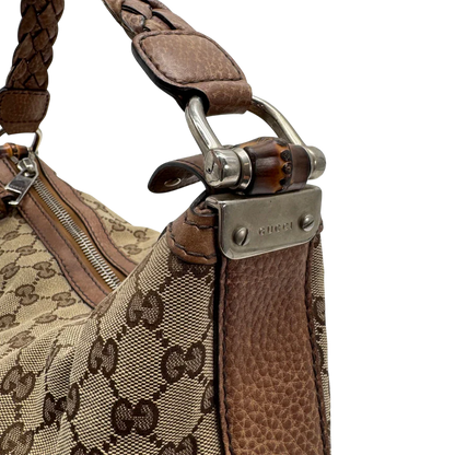 https://cdn.shopify.com/s/files/1/0564/9376/8855/files/Gucci_Schultertasche_Hobo_Bamboo_monogram_beige_vintage_GG2295.webp?v=1779968857