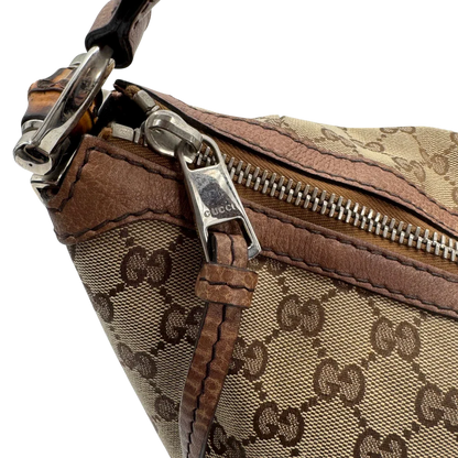 https://cdn.shopify.com/s/files/1/0564/9376/8855/files/Gucci_Schultertasche_Hobo_Bamboo_monogram_beige_vintage_GG2296.webp?v=1779968857