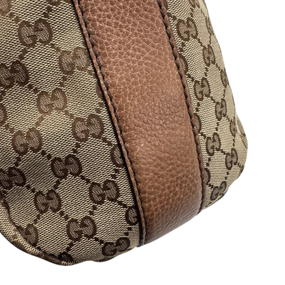 https://cdn.shopify.com/s/files/1/0564/9376/8855/files/Gucci_Schultertasche_Hobo_Bamboo_monogram_beige_vintage_GG2298.webp?v=1779968857