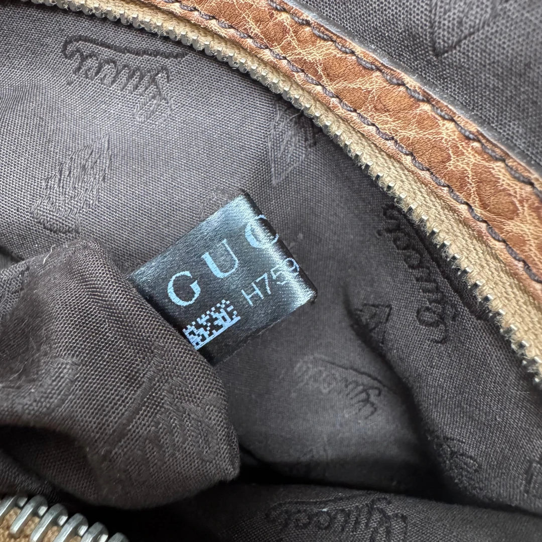 https://cdn.shopify.com/s/files/1/0564/9376/8855/files/Gucci_Schultertasche_Hobo_Bamboo_monogram_beige_vintage_GG2303.webp?v=1779968857