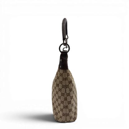 https://cdn.shopify.com/s/files/1/0564/9376/8855/files/Gucci_Schultertasche_Hobo_monogram_beige_vintage_GG8346.webp?v=1780575451