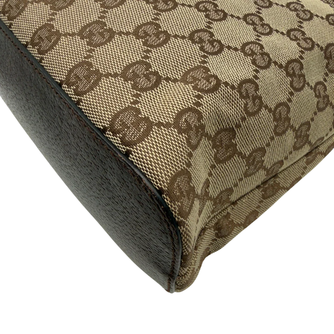 https://cdn.shopify.com/s/files/1/0564/9376/8855/files/Gucci_Schultertasche_Hobo_monogram_beige_vintage_GG8349.webp?v=1780575452