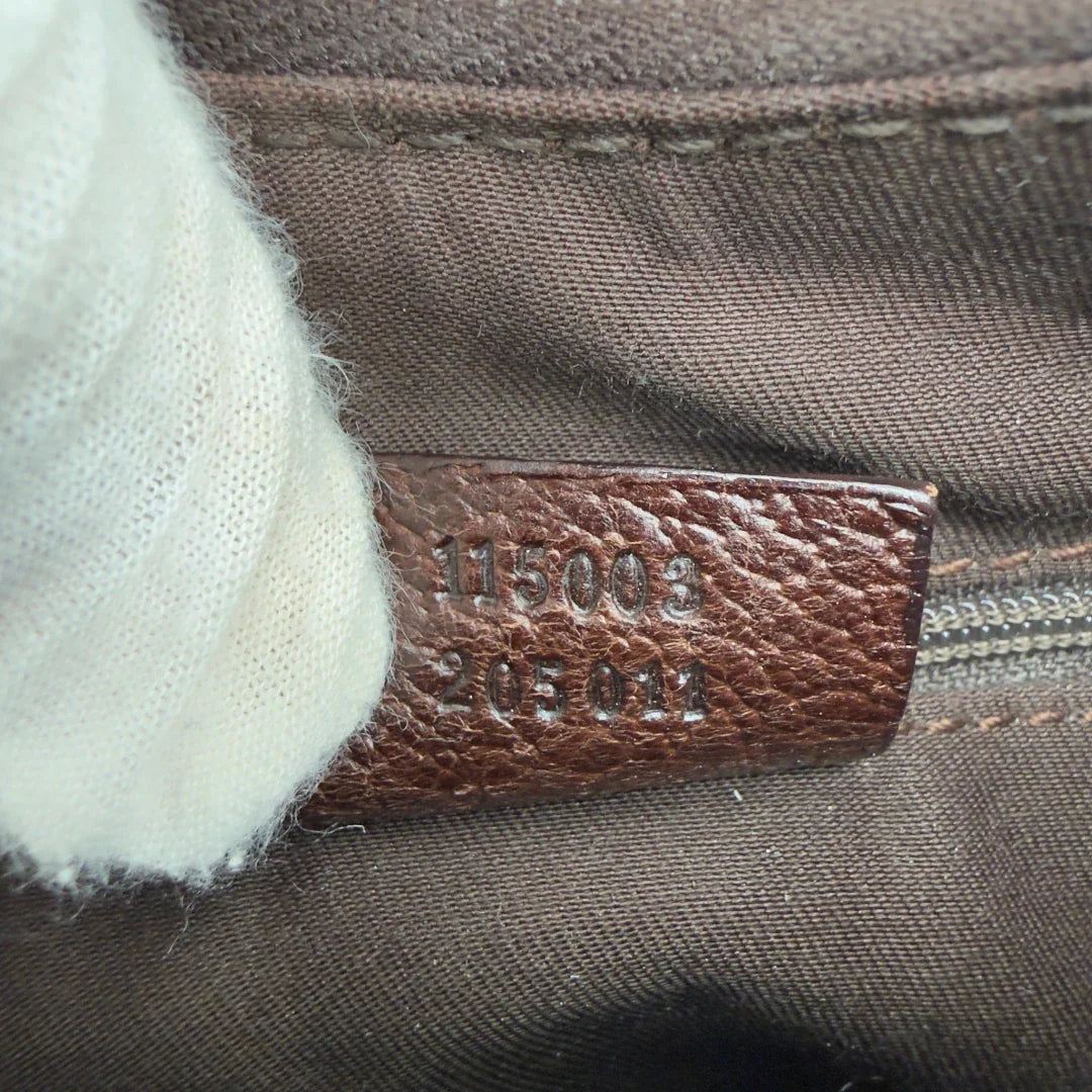 https://cdn.shopify.com/s/files/1/0564/9376/8855/files/Gucci_Schultertasche_Hobo_monogram_beige_vintage_GG8357.webp?v=1780575452
