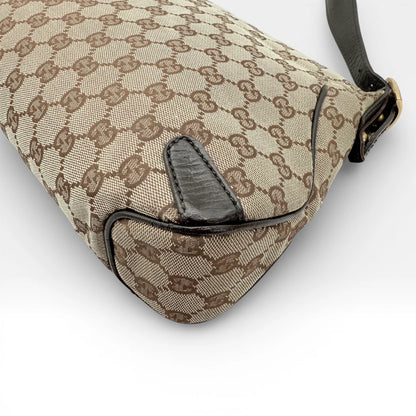 https://cdn.shopify.com/s/files/1/0564/9376/8855/files/Gucci_Schultertasche_Horsebit_1955_monogram_beige_vintage_GG_7218.webp?v=1767277034