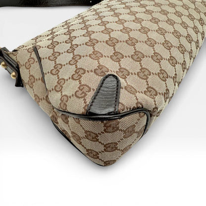 https://cdn.shopify.com/s/files/1/0564/9376/8855/files/Gucci_Schultertasche_Horsebit_1955_monogram_beige_vintage_GG_7219.webp?v=1767277034