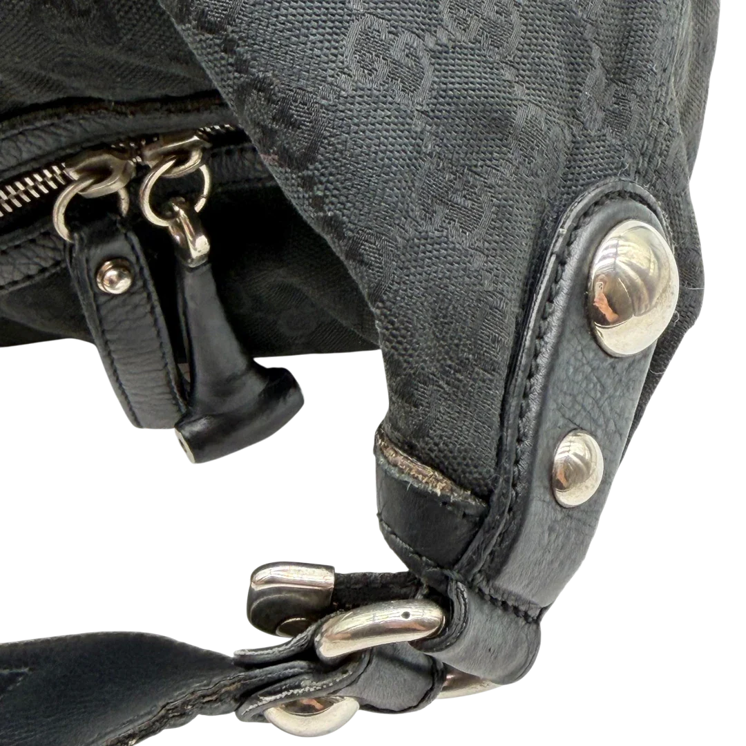 https://cdn.shopify.com/s/files/1/0564/9376/8855/files/Gucci_Schultertasche_Horsebit_Hobo_large_monogram_schwarz_12.webp?v=1781855743
