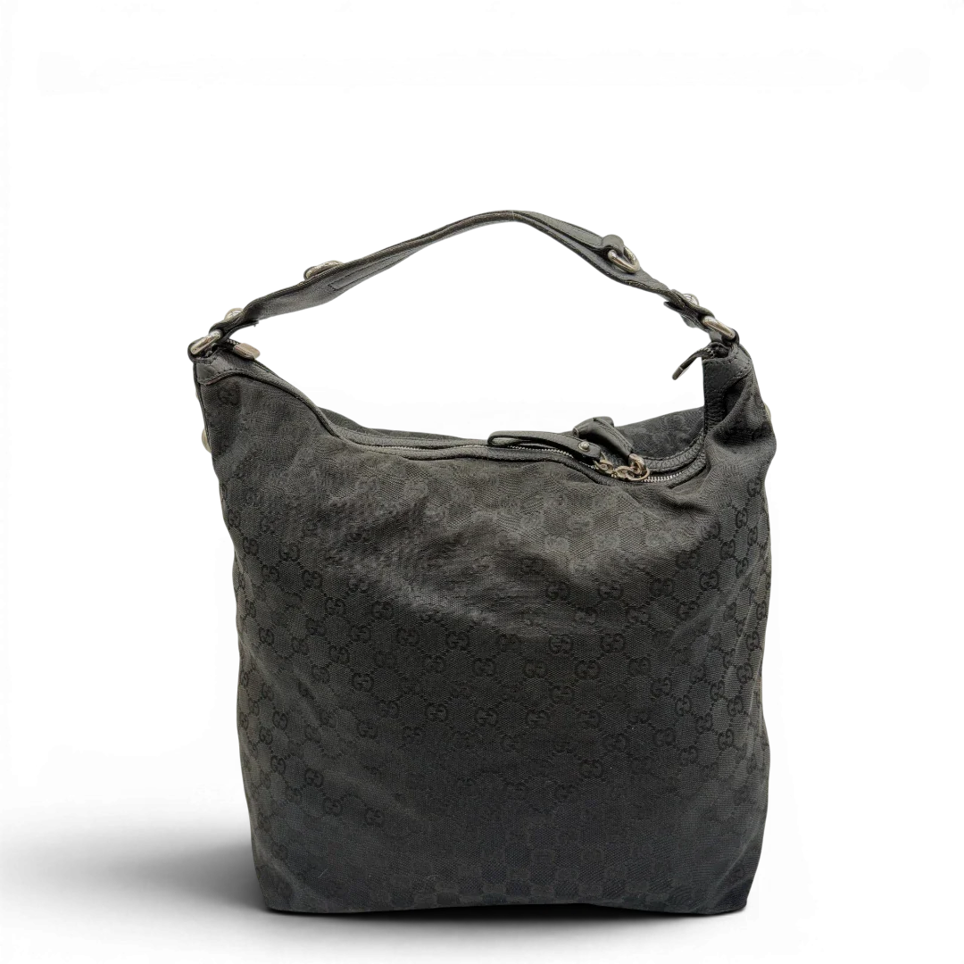 https://cdn.shopify.com/s/files/1/0564/9376/8855/files/Gucci_Schultertasche_Horsebit_Hobo_large_monogram_schwarz_2.webp?v=1781855742
