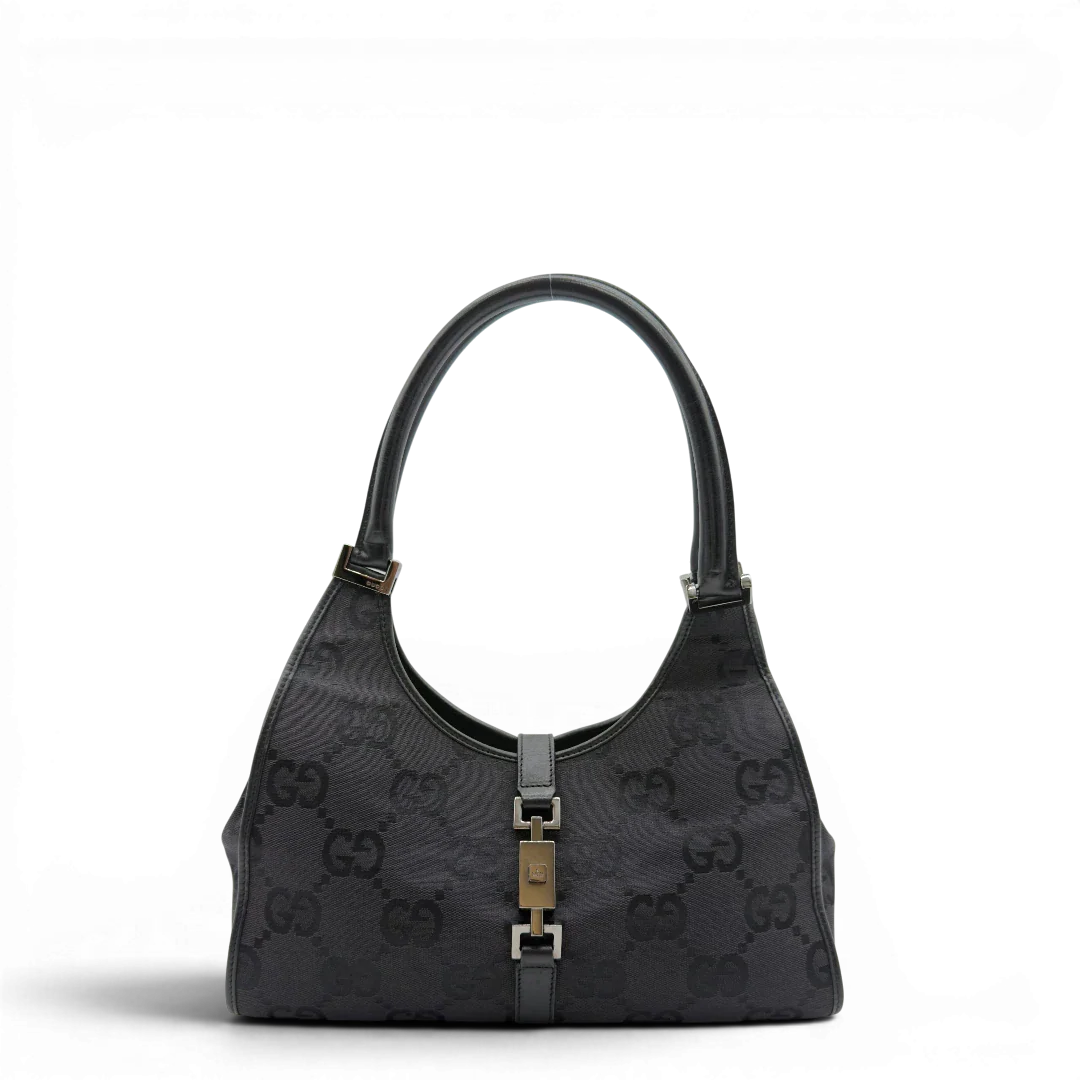 https://cdn.shopify.com/s/files/1/0564/9376/8855/files/Gucci_Schultertasche_Jackie_Jumbo_GG_monogram_schwarz_1.webp?v=1782904974