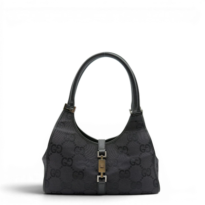 https://cdn.shopify.com/s/files/1/0564/9376/8855/files/Gucci_Schultertasche_Jackie_Jumbo_GG_monogram_schwarz_1.webp?v=1782904974