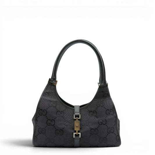 https://cdn.shopify.com/s/files/1/0564/9376/8855/files/Gucci_Schultertasche_Jackie_Jumbo_GG_monogram_schwarz_1.webp?v=1782904974