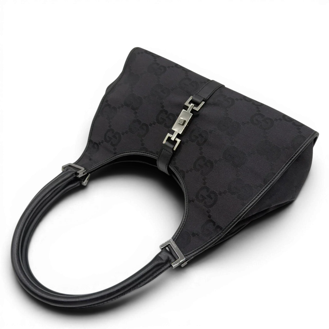 https://cdn.shopify.com/s/files/1/0564/9376/8855/files/Gucci_Schultertasche_Jackie_Jumbo_GG_monogram_schwarz_10.webp?v=1782904974