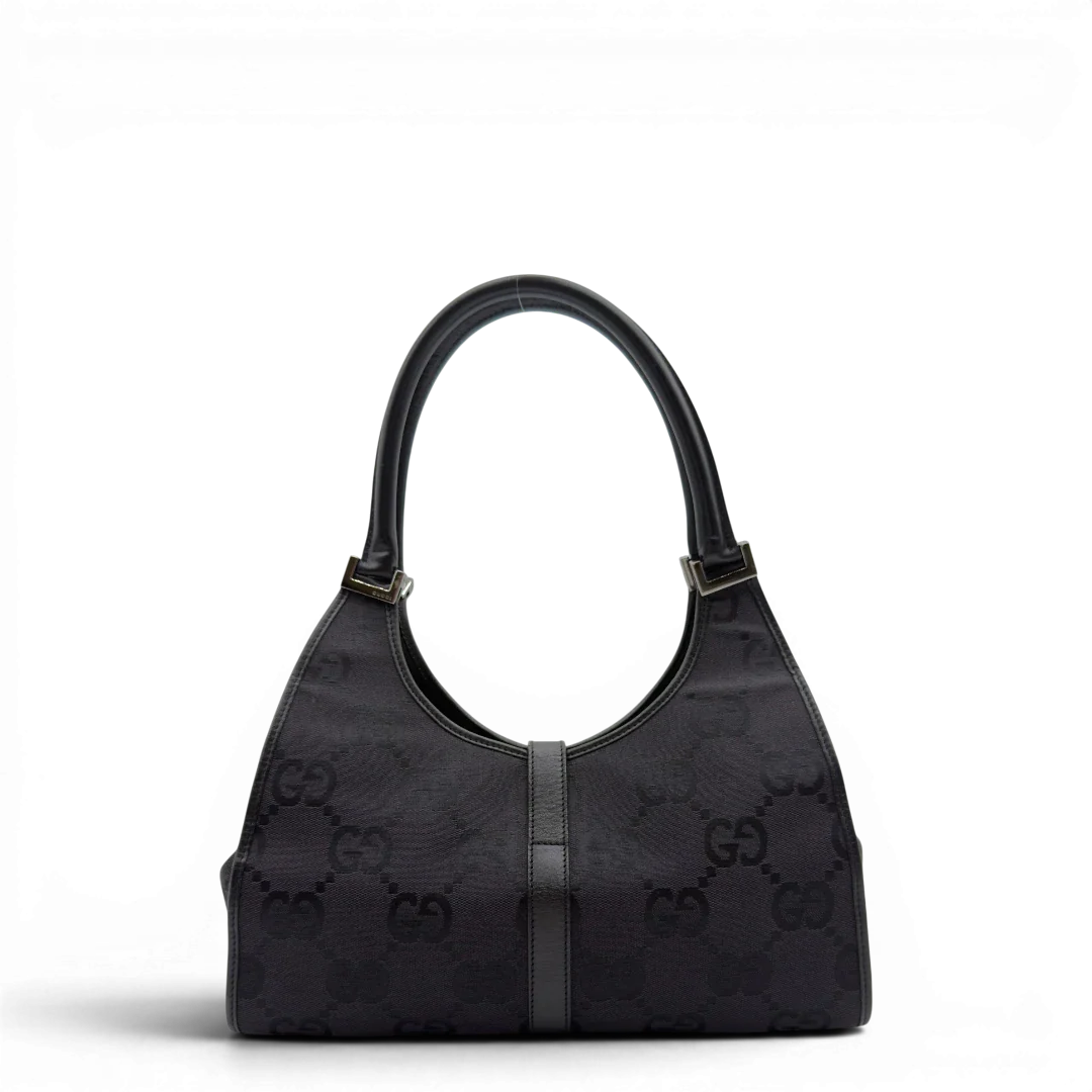 https://cdn.shopify.com/s/files/1/0564/9376/8855/files/Gucci_Schultertasche_Jackie_Jumbo_GG_monogram_schwarz_2.webp?v=1782904973