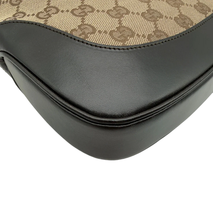 https://cdn.shopify.com/s/files/1/0564/9376/8855/files/Gucci_Schultertasche_Jackie_Sherry_Line_monogram_beige_vintage_GG7468.webp?v=1779290407