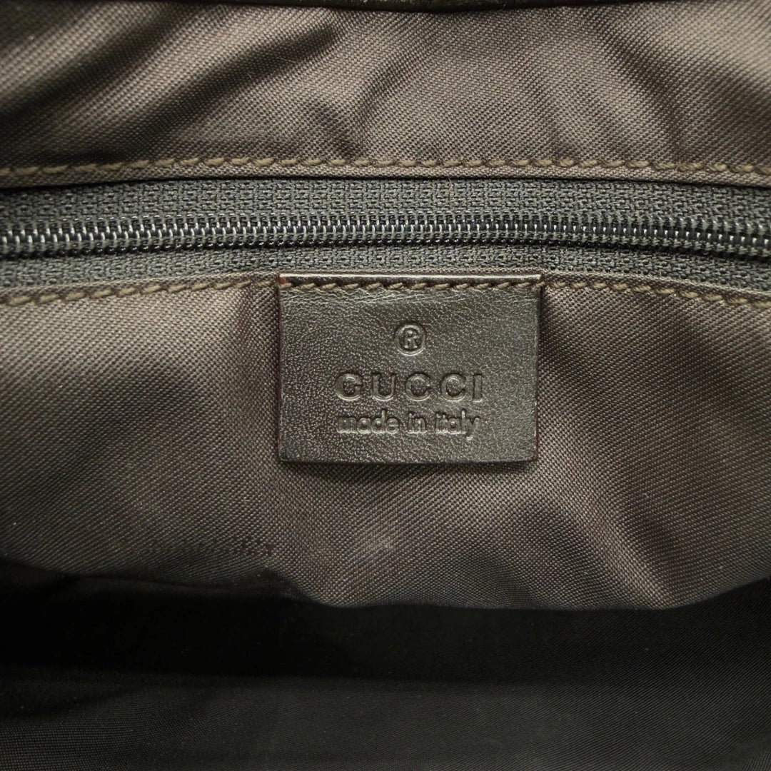 https://cdn.shopify.com/s/files/1/0564/9376/8855/files/Gucci_Schultertasche_Jackie_Sherry_Line_monogram_beige_vintage_GG7476.webp?v=1779290408