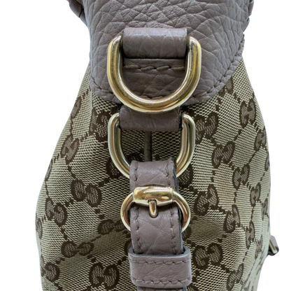 https://cdn.shopify.com/s/files/1/0564/9376/8855/files/Gucci_Schultertasche_Jackie_large_monogram_beige_vintage_GG7976.webp?v=1779966226
