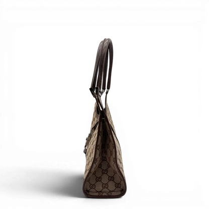 https://cdn.shopify.com/s/files/1/0564/9376/8855/files/Gucci_Schultertasche_Jackie_monogram_beige___braun_vintage_GG7379.webp?v=1779964270