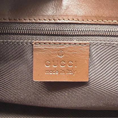 https://cdn.shopify.com/s/files/1/0564/9376/8855/files/Gucci_Schultertasche_Jackie_monogram_beige___braun_vintage_GG7391.webp?v=1779964272