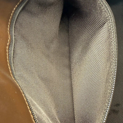 https://cdn.shopify.com/s/files/1/0564/9376/8855/files/Gucci_Schultertasche_Jackie_monogram_beige___braun_vintage_GG7393.webp?v=1779964271