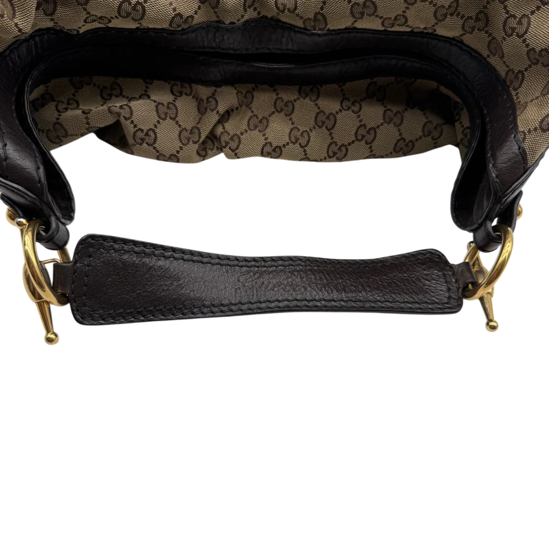 https://cdn.shopify.com/s/files/1/0564/9376/8855/files/Gucci_Schultertasche_Jockey_Hobo_large_monogram_beige_10.webp?v=1783516120