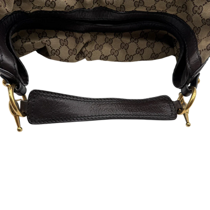 https://cdn.shopify.com/s/files/1/0564/9376/8855/files/Gucci_Schultertasche_Jockey_Hobo_large_monogram_beige_10.webp?v=1783516120