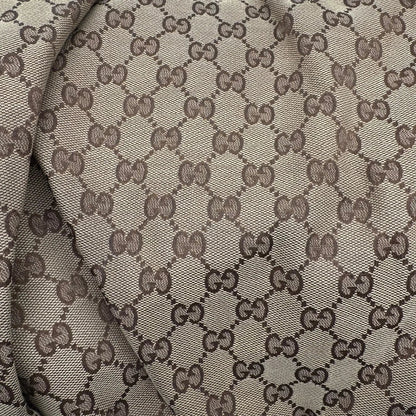 https://cdn.shopify.com/s/files/1/0564/9376/8855/files/Gucci_Schultertasche_Jockey_Hobo_large_monogram_beige_15.webp?v=1783516121