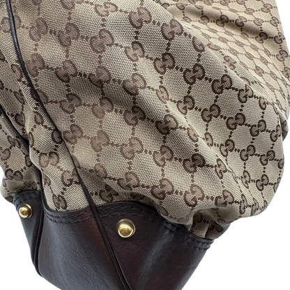 https://cdn.shopify.com/s/files/1/0564/9376/8855/files/Gucci_Schultertasche_Jockey_Hobo_large_monogram_beige_17.webp?v=1783516120