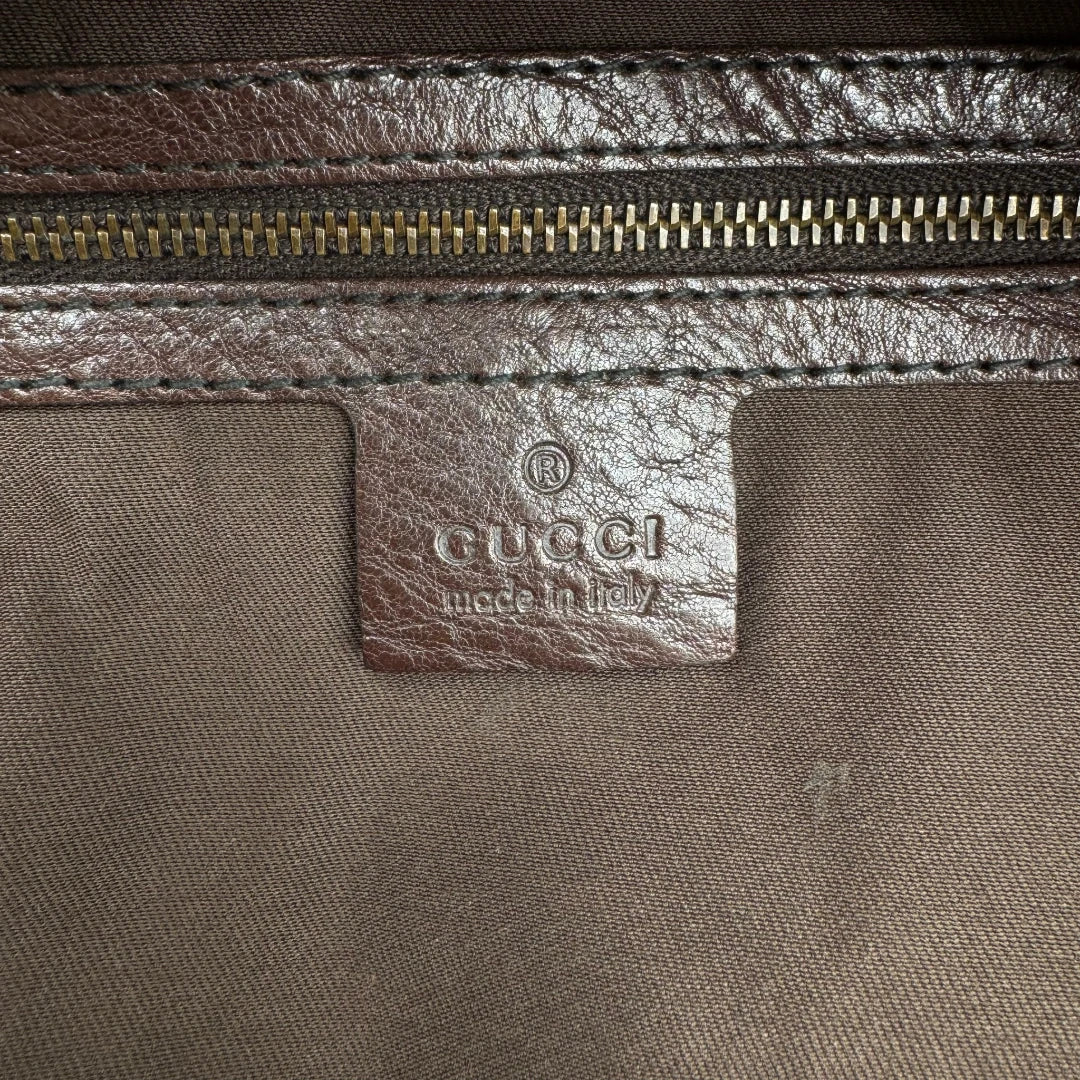 https://cdn.shopify.com/s/files/1/0564/9376/8855/files/Gucci_Schultertasche_Jockey_Hobo_large_monogram_beige_20.webp?v=1783516121