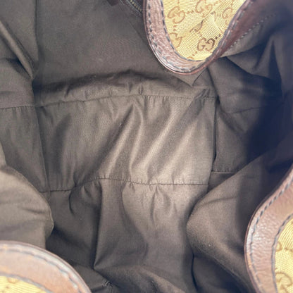 https://cdn.shopify.com/s/files/1/0564/9376/8855/files/Gucci_Schultertasche_Jockey_Hobo_large_monogram_beige_vintage_GG2166.webp?v=1779963372