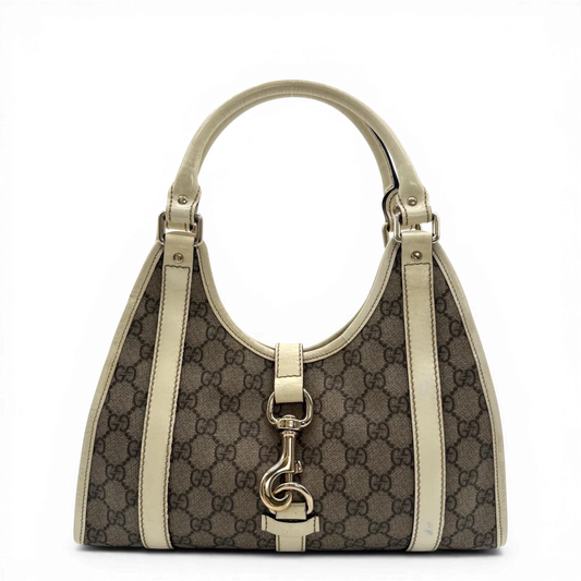 https://cdn.shopify.com/s/files/1/0564/9376/8855/files/Gucci_Schultertasche_New_Jackie_Supreme_GG_monogram_beige_vintage_GG4386.webp?v=1776344187
