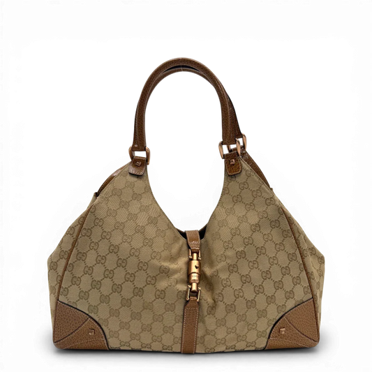 https://cdn.shopify.com/s/files/1/0564/9376/8855/files/Gucci_Schultertasche_New_Jackie_large_monogram_beige_vintage_GG6123.webp?v=1775065032