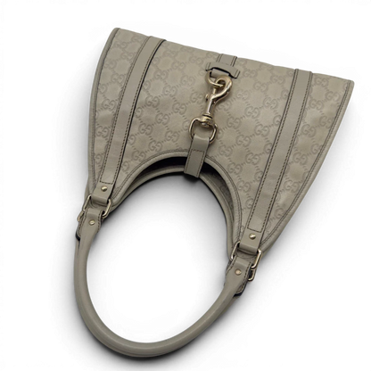 https://cdn.shopify.com/s/files/1/0564/9376/8855/files/Gucci_Schultertasche_New_Jackie_small_aus_Leder_monogram_weiss_vintage_GG7197.webp?v=1778669917