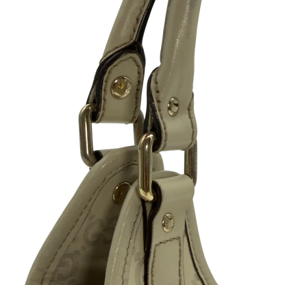https://cdn.shopify.com/s/files/1/0564/9376/8855/files/Gucci_Schultertasche_New_Jackie_small_aus_Leder_monogram_weiss_vintage_GG7199.webp?v=1778669916