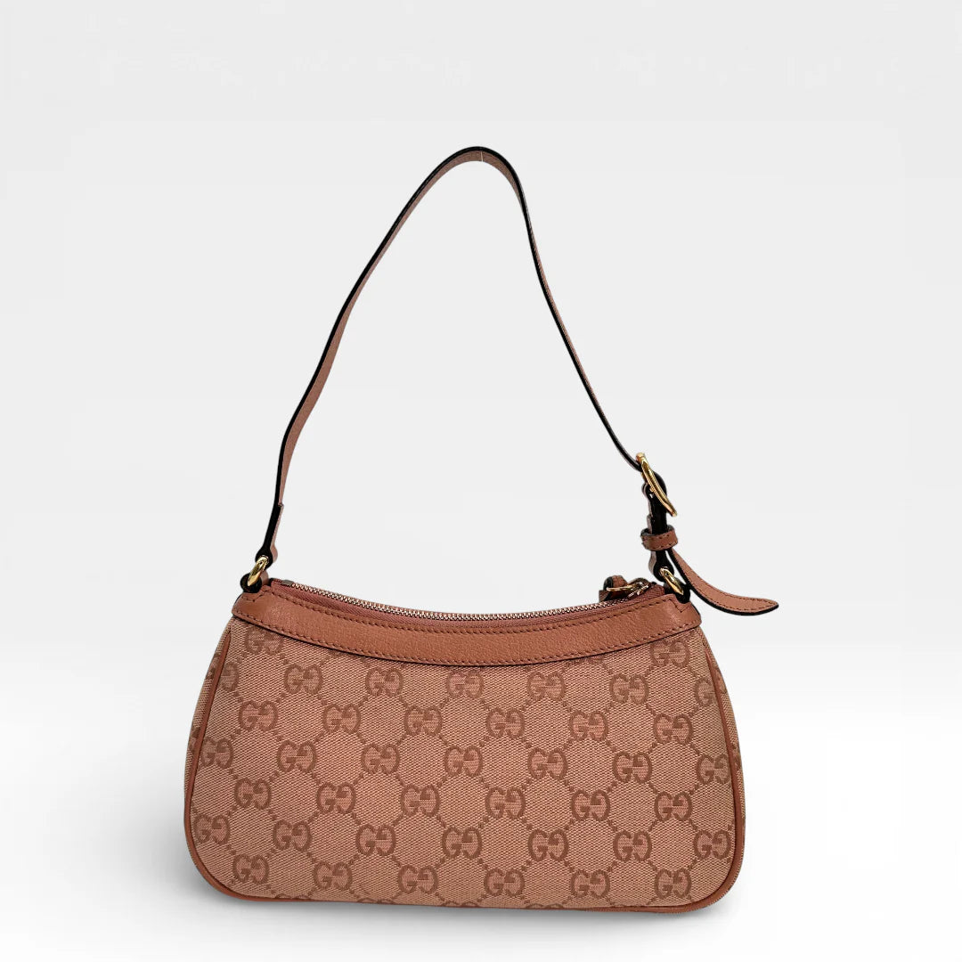 https://cdn.shopify.com/s/files/1/0564/9376/8855/files/Gucci_Schultertasche_Ophidia_Small_GG_Supreme_rosa_vintage_GG_1667.webp?v=1767925256