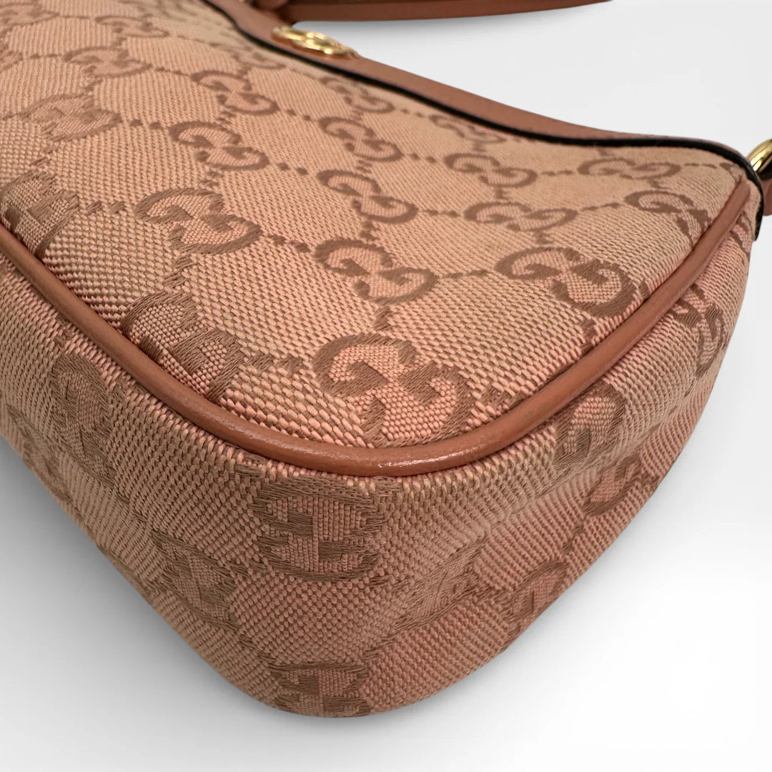 https://cdn.shopify.com/s/files/1/0564/9376/8855/files/Gucci_Schultertasche_Ophidia_Small_GG_Supreme_rosa_vintage_GG_1671.webp?v=1767925256