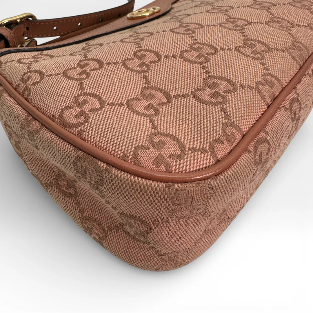 https://cdn.shopify.com/s/files/1/0564/9376/8855/files/Gucci_Schultertasche_Ophidia_Small_GG_Supreme_rosa_vintage_GG_1672.webp?v=1767925256