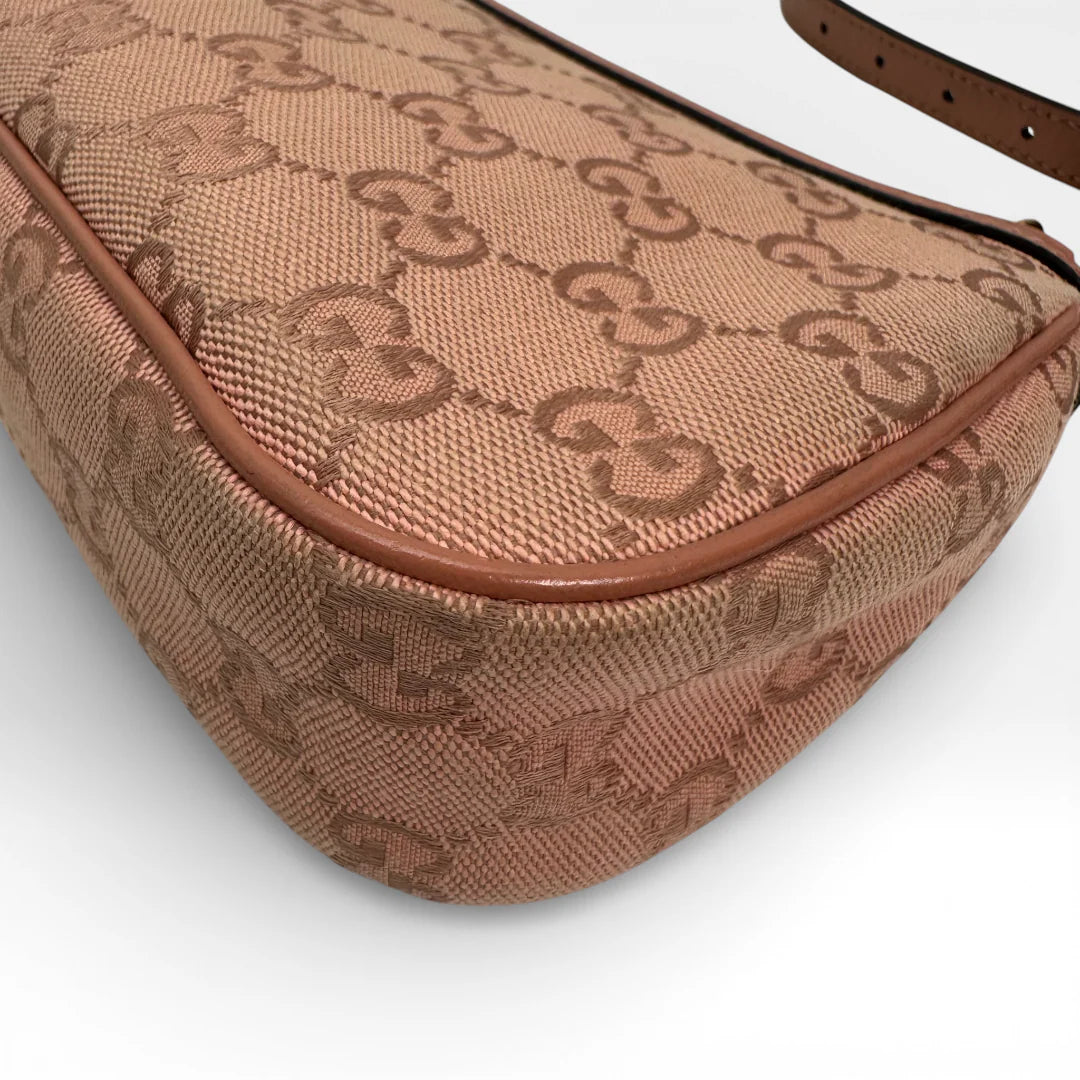 https://cdn.shopify.com/s/files/1/0564/9376/8855/files/Gucci_Schultertasche_Ophidia_Small_GG_Supreme_rosa_vintage_GG_1673.webp?v=1767925256