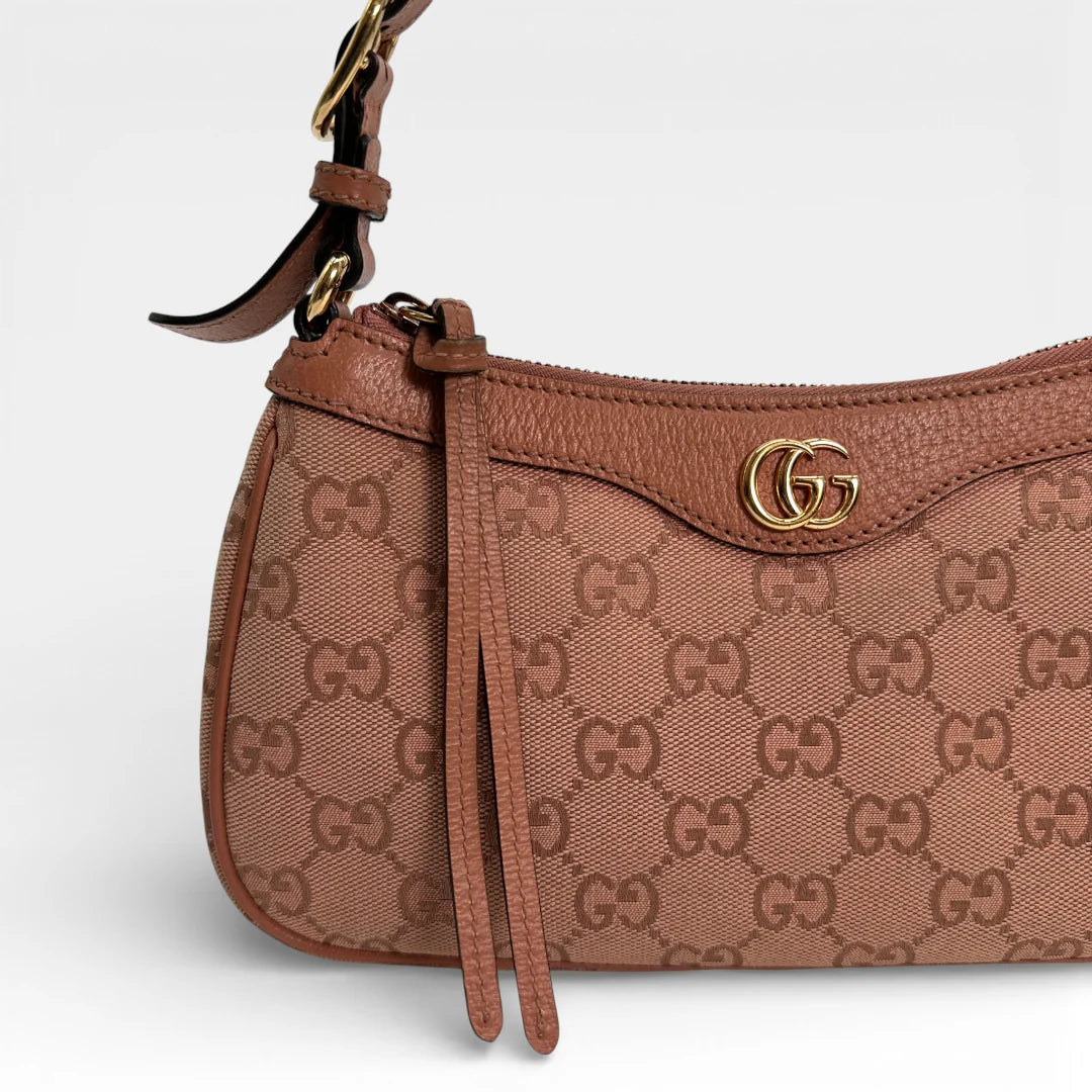 https://cdn.shopify.com/s/files/1/0564/9376/8855/files/Gucci_Schultertasche_Ophidia_Small_GG_Supreme_rosa_vintage_GG_1676.webp?v=1767925256