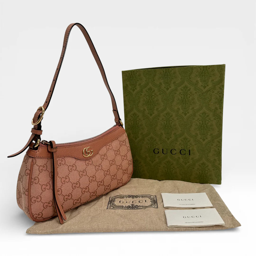https://cdn.shopify.com/s/files/1/0564/9376/8855/files/Gucci_Schultertasche_Ophidia_Small_GG_Supreme_rosa_vintage_GG_1685.webp?v=1767925256