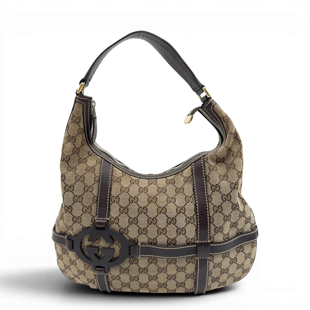 https://cdn.shopify.com/s/files/1/0564/9376/8855/files/Gucci_Schultertasche_Royal_Hobo_monogram_beige_1.webp?v=1782908724