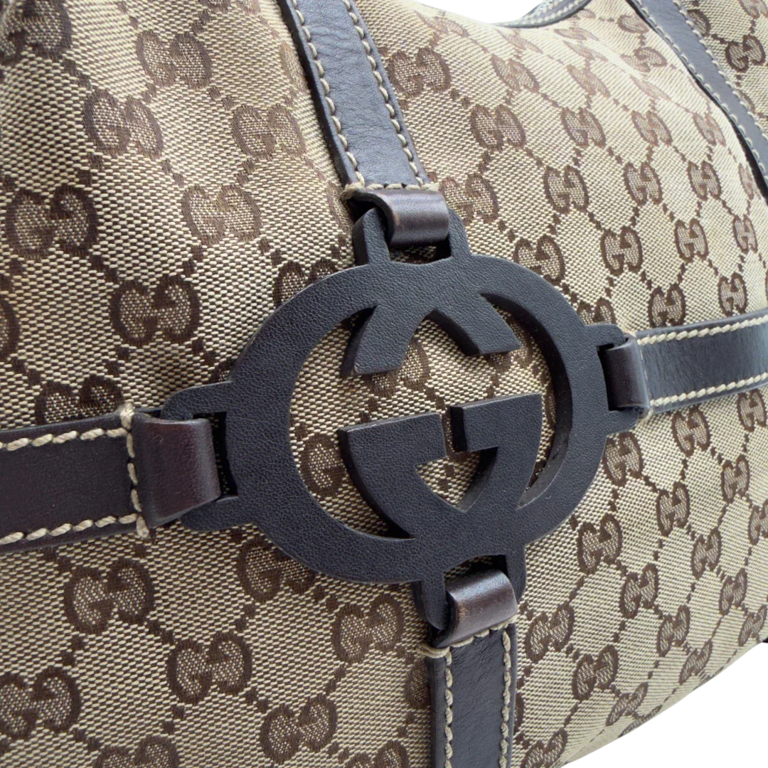 https://cdn.shopify.com/s/files/1/0564/9376/8855/files/Gucci_Schultertasche_Royal_Hobo_monogram_beige_10.webp?v=1782908725
