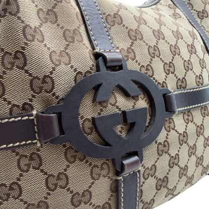 https://cdn.shopify.com/s/files/1/0564/9376/8855/files/Gucci_Schultertasche_Royal_Hobo_monogram_beige_10.webp?v=1782908725