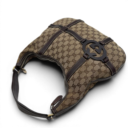 https://cdn.shopify.com/s/files/1/0564/9376/8855/files/Gucci_Schultertasche_Royal_Hobo_monogram_beige_11.webp?v=1782908724