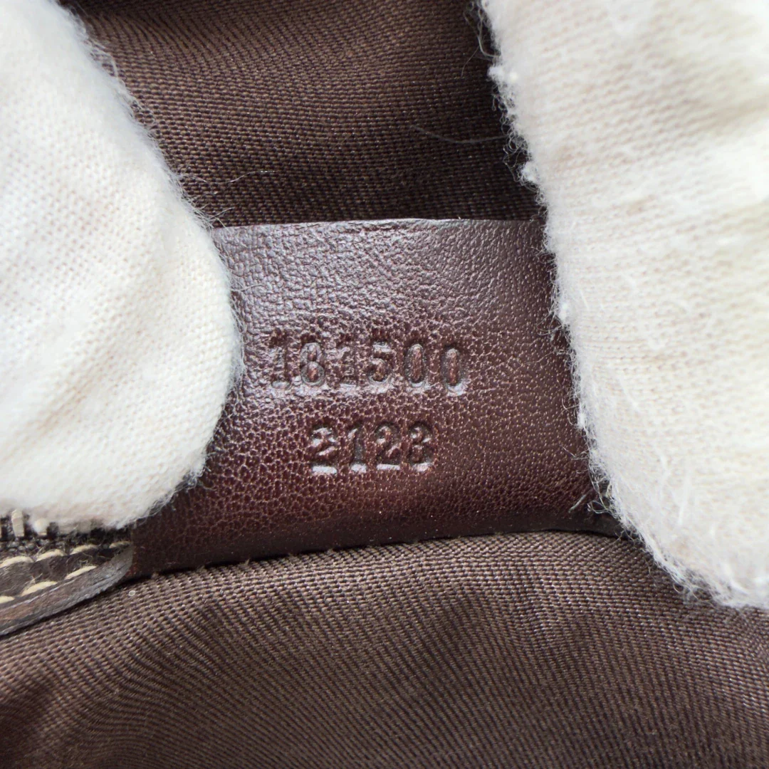 https://cdn.shopify.com/s/files/1/0564/9376/8855/files/Gucci_Schultertasche_Royal_Hobo_monogram_beige_14.webp?v=1782908724