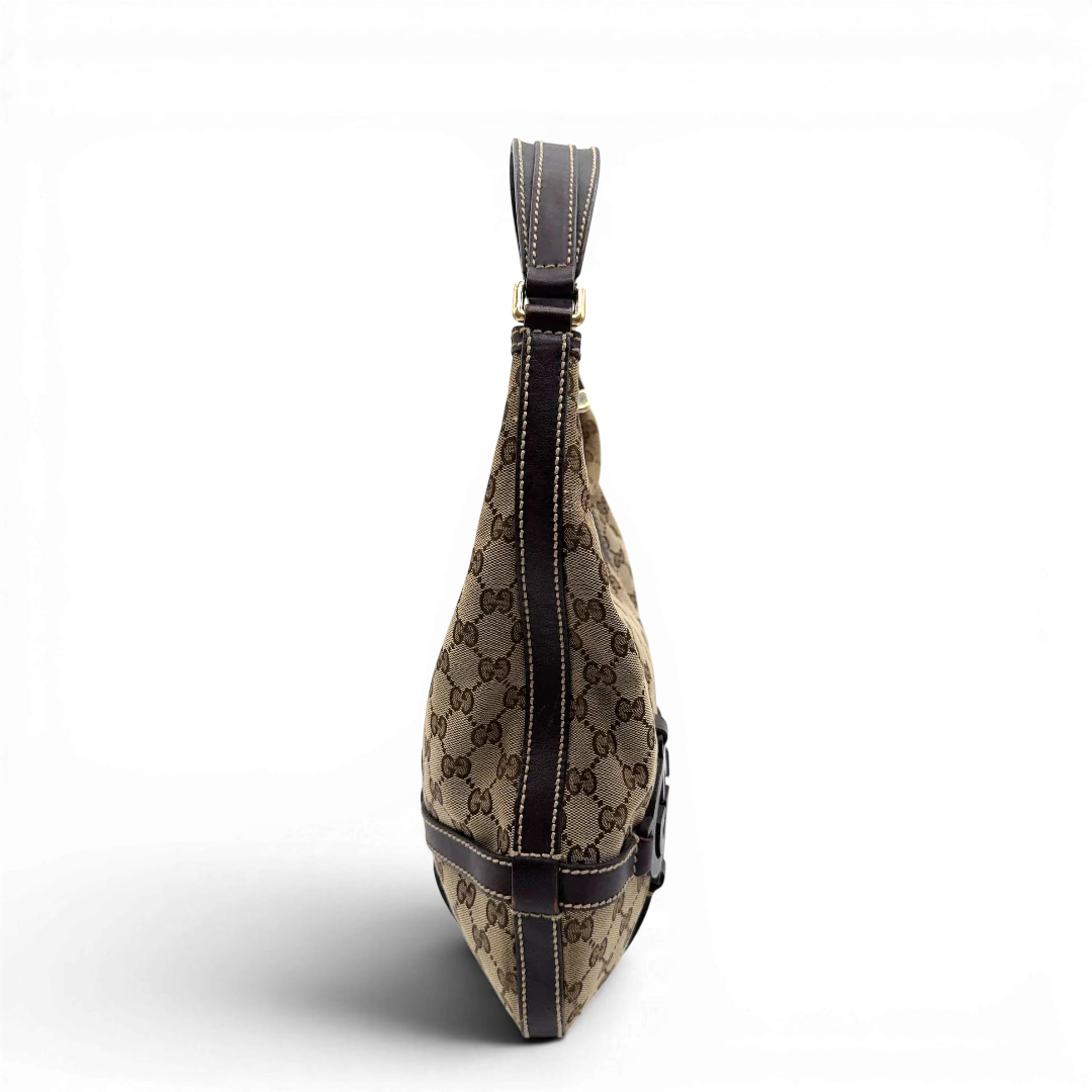 https://cdn.shopify.com/s/files/1/0564/9376/8855/files/Gucci_Schultertasche_Royal_Hobo_monogram_beige_3.webp?v=1782908724