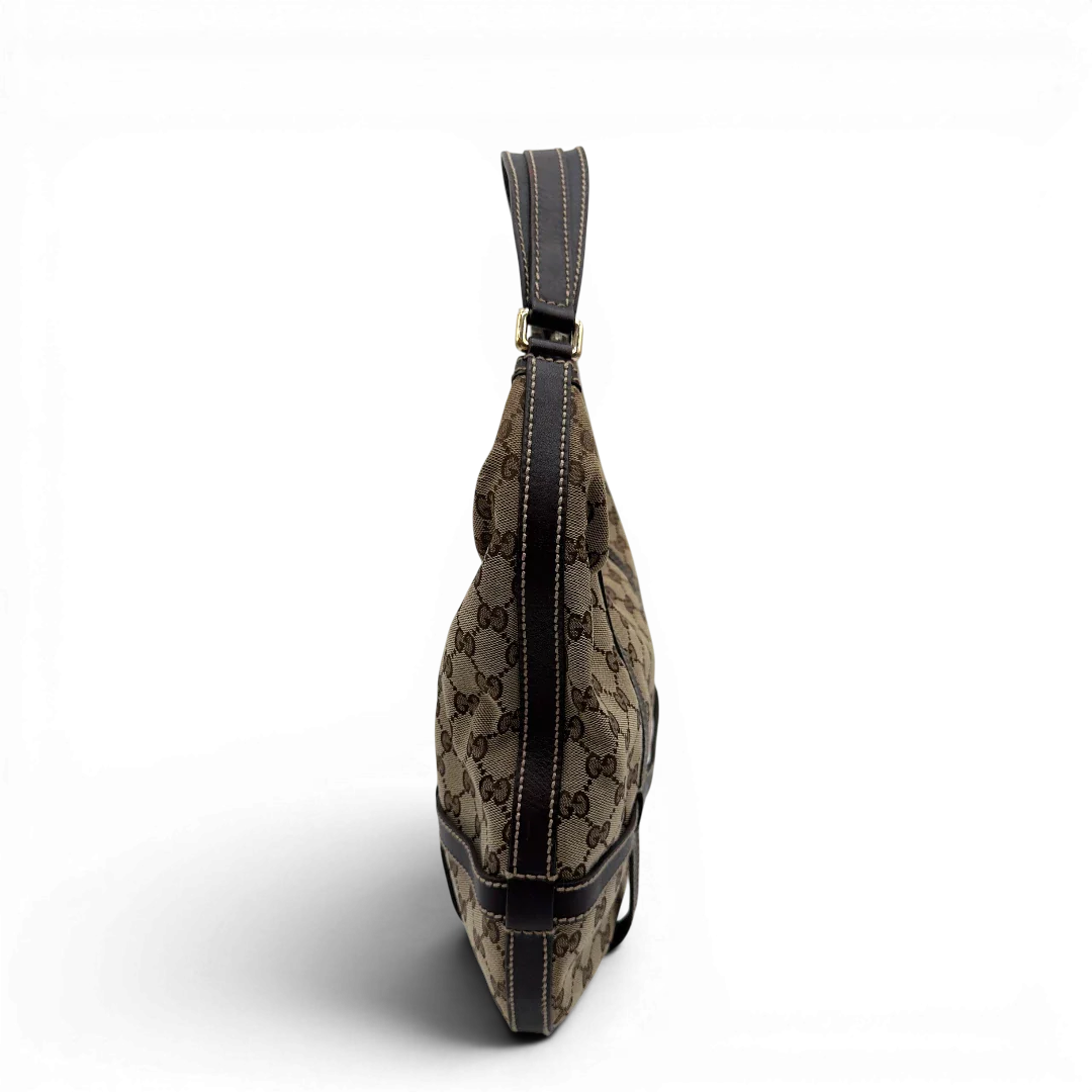 https://cdn.shopify.com/s/files/1/0564/9376/8855/files/Gucci_Schultertasche_Royal_Hobo_monogram_beige_4.webp?v=1782908724